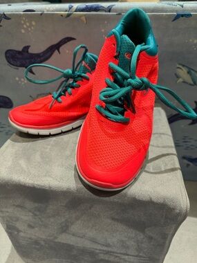Champion Red Athletic Shoes with Teal Accents